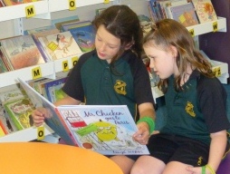Students reading a book